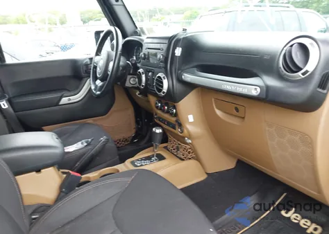 2014 Jeep Wrangler Unlimited Sahara z USA, uszkodzony, nr VIN 1C4BJWEG1EL198513